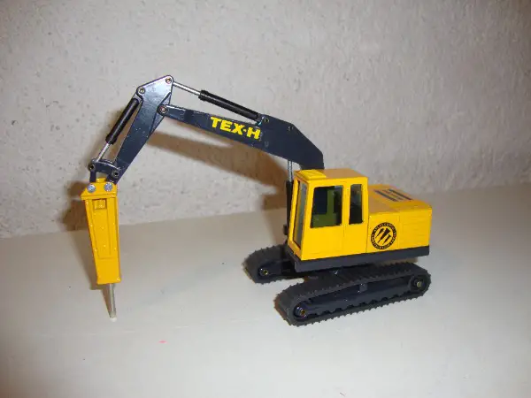 Bagger TEX-H Atlas Copco mit Bohrhammer