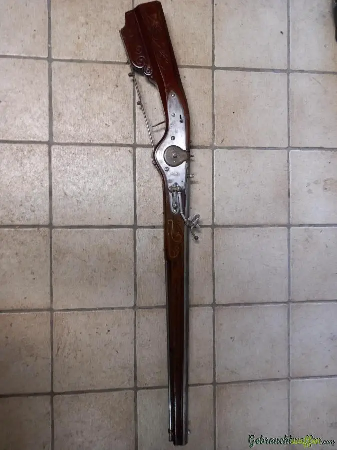 Alte Steinschlosswaffe